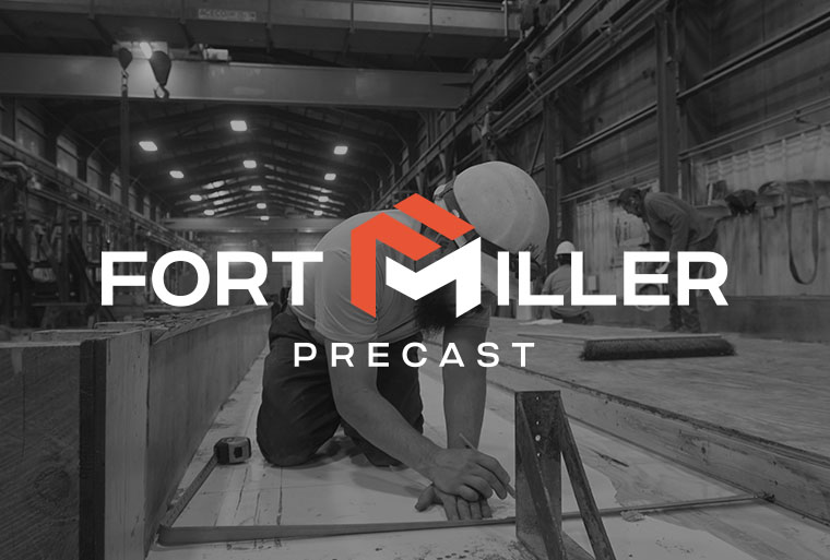 construction worker making marks for cutting material