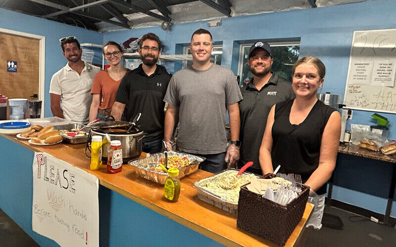 fort miller employees volunteering at homeless shelter in Saratoga Springs, NY