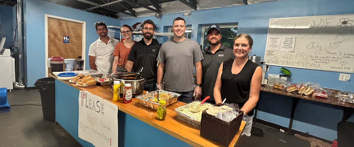 fort miller employees volunteering at homeless shelter in Saratoga Springs, NY